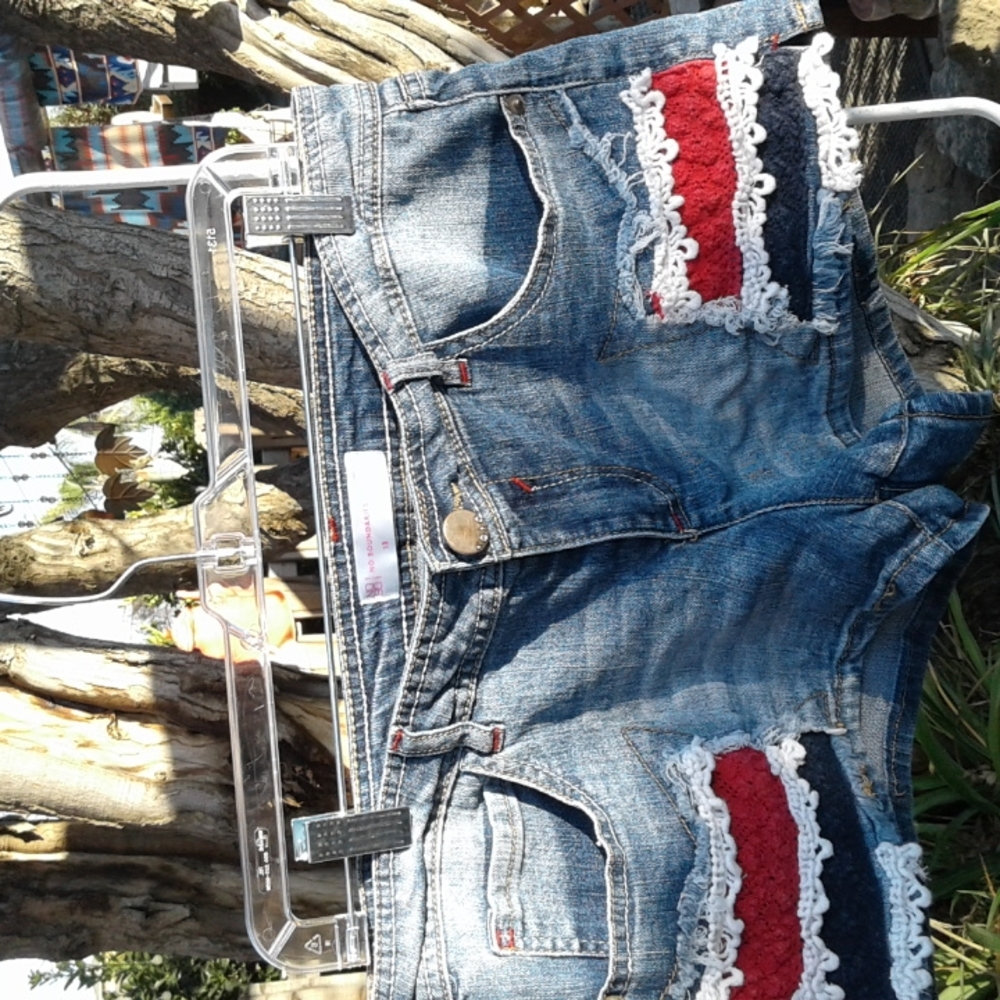 Women's short size 13 distressed brand is no boundaries